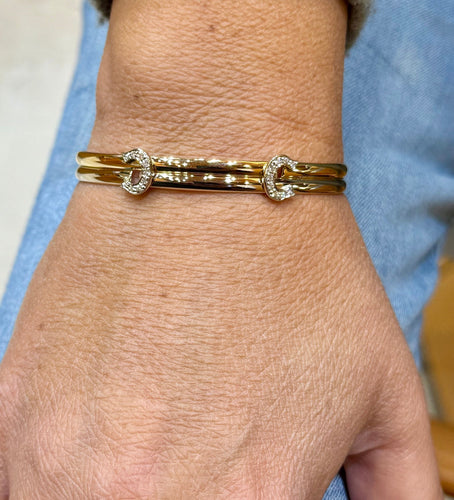Bracelet Bracelet Cartier vintage double C en or et diamants 58 Facettes