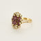Bague 57 Bague en or jaune, rubis et diamants 58 Facettes B250549