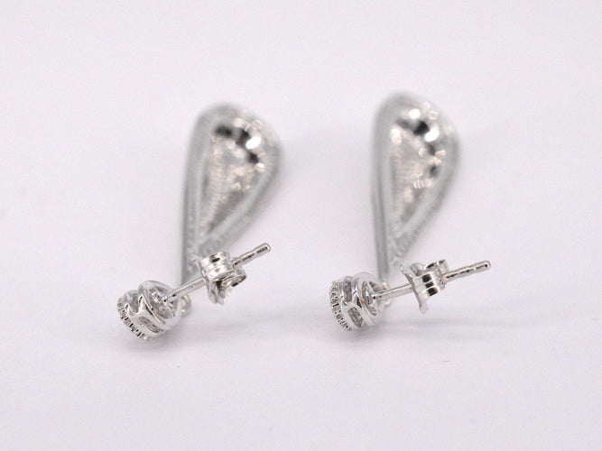 Boucles d'oreilles Boucle d'oreille en or blanc sertie de diamants 58 Facettes 2159