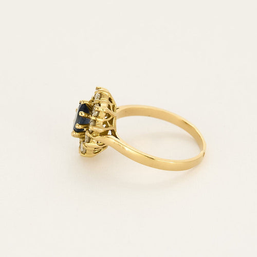 Bague marguerite en or jaune, saphir et diamants
