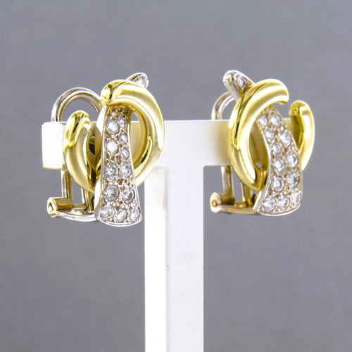 Boucles d'oreilles Boucles d'oreilles bicolores en or serties de diamants taille brillant 58 Facettes