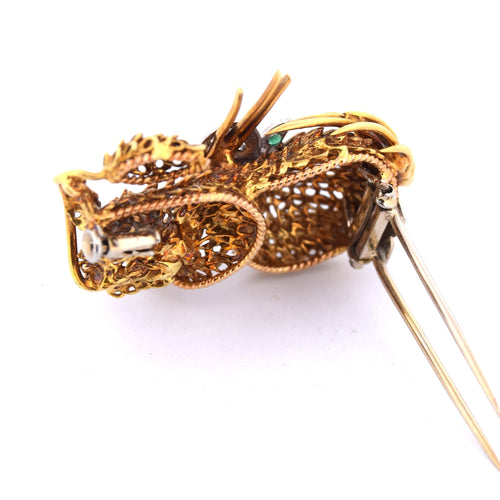 Broche Broche en or jaune et or blanc avec émeraudes et diamants 58 Facettes