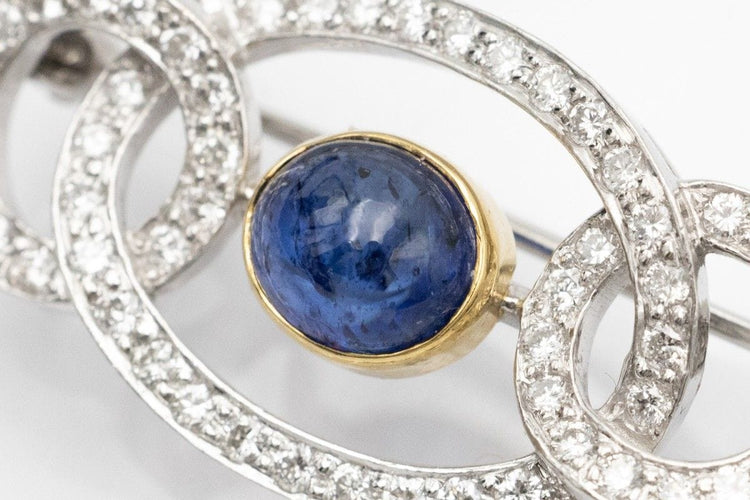 Broche Broche Art Déco saphir cabochon et diamants en or blanc 18k 58 Facettes 10835