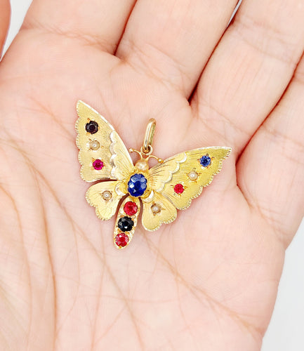 Pendentif Pendentif or rose papillon, pierres de couleur et perles 58 Facettes A05324