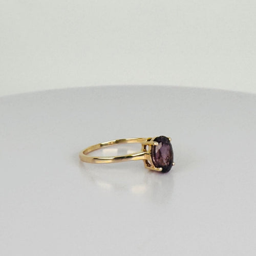 Bague Bague en or jaune avec spinelle naturelle ovale violette 58 Facettes 2504088