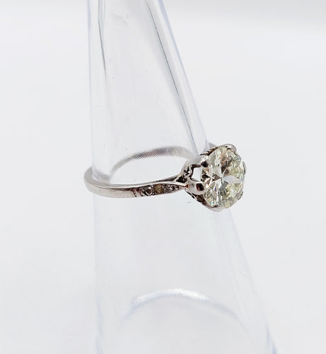 Bague 48 Bague solitaire art déco, platine et diamants 58 Facettes A05538