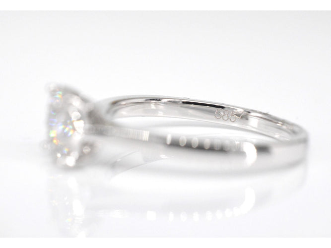 Bague entourage en or blanc avec diamants