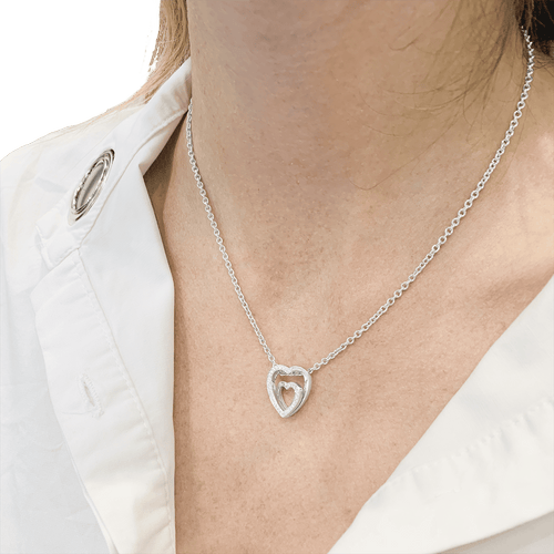 Collier Collier Cartier, "Coeurs", or blanc, diamants. 58 Facettes 34760