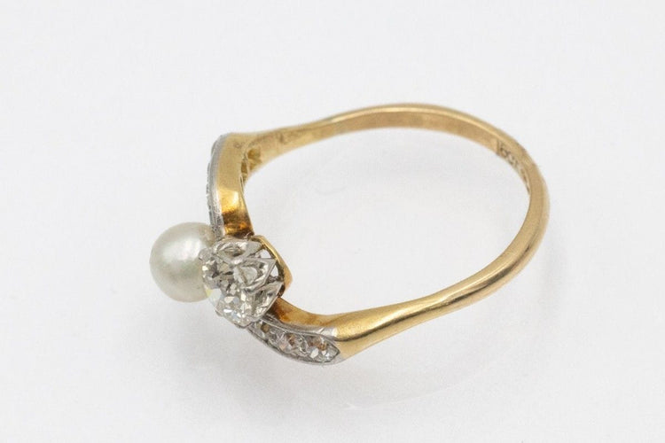 Bague 55 Bague « toi et moi » en or jaune et platine avec perle et diamants, première moitié du XXe siècle. 58 Facettes 11480