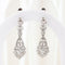 Boucles d'oreilles Boucles d'oreilles vintage ajourées en or blanc 18 carats serties de diamants 58 Facettes 135023B