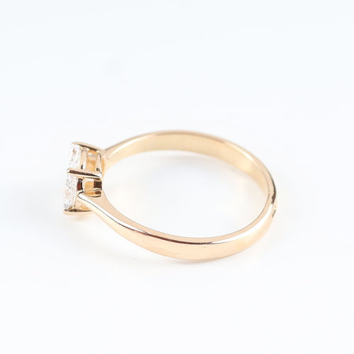 Bague en or rose sertie de diamants taille marquise et princesse