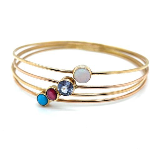 Bracelet Bracelet ancien 4 joncs or jaune, multi pierres 58 Facettes