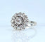 Bague 54 Bague marguerite en or blanc, platine et diamants 58 Facettes AB625