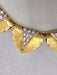 Collier Collier en or jaune motif feuille et diamants 58 Facettes