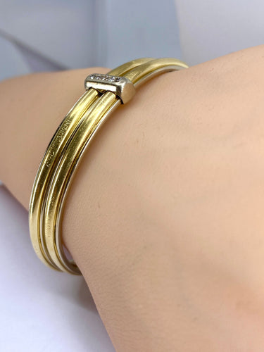 Bracelet Bracelet double joncs, or blanc, diamants, Yves Saint Laurent 58 Facettes AB601