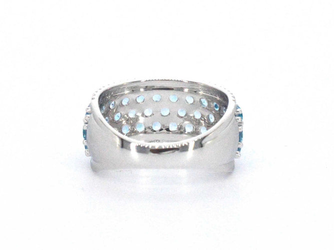 Bague 54 Bague en or blanc avec topazes et diamants 58 Facettes 2356