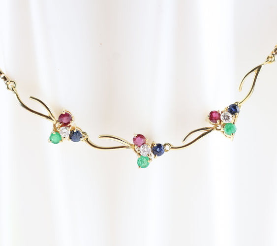 Collier Collier ras-de-cou vintage en or jaune 14 carats orné de diamants, d'émeraudes, de saphirs et de rubis 58 Facettes 159/24T