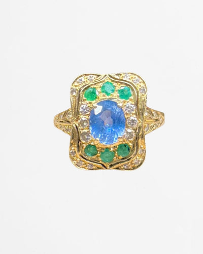 Bague 53 Bague entourage Pompadour en or jaune 18 carats saphir, tanzanites et diamants 58 Facettes