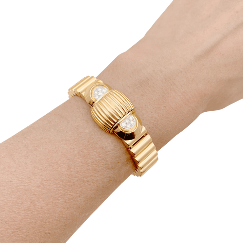 Montre Montre vintage secrète UTI, or jaune et diamants. 58 Facettes 34615