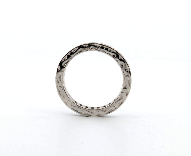 Bague 54 Bague d'éternité en platine et diamants 58 Facettes