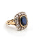 Bague en or jaune 18 carats 2028 C avec saphir central et diamants environnants
