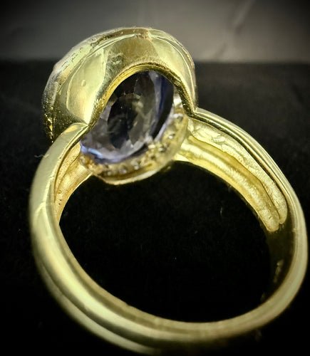 Bague 63 Bague or jaune sertie d'une Tanzanite de 16 carats 58 Facettes