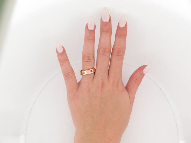 Bague 55 bague CARTIER love t55 en or 18k pierres saphir grenat amethyste 58 Facettes 271117