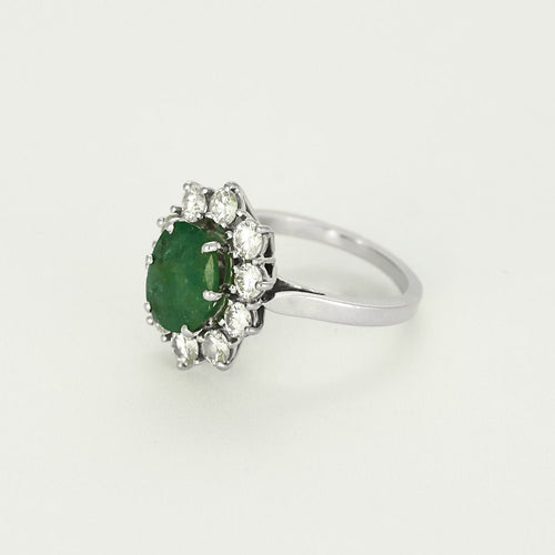 Bague 50 Bague marguerite en or blanc, émeraude et diamants 58 Facettes B250523