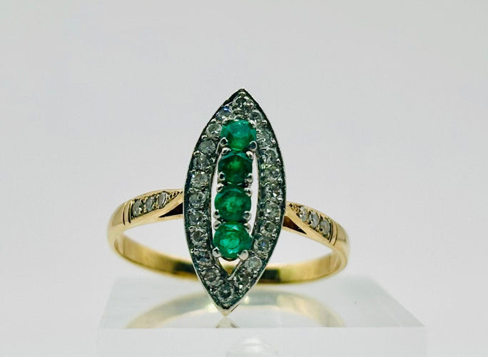 Bague Bague marquise ornée d'émeraudes et de diamants 58 Facettes 50264