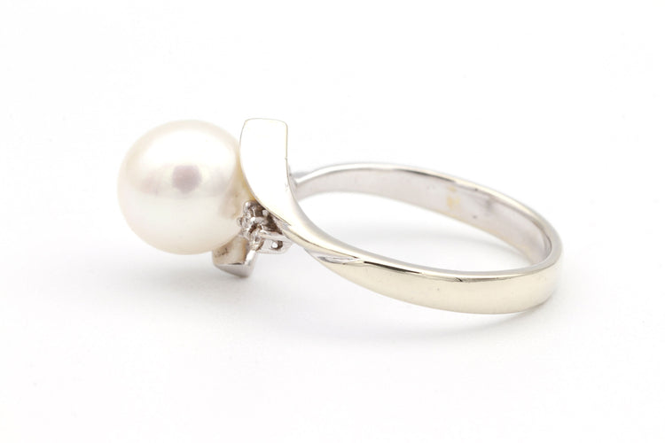 Bague 52 Bague Années 70 en or jaune sertie d'une perle et de diamants 58 Facettes 19113