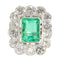 Luxe d'après-guerre : bague de fiançailles en émeraude et diamants