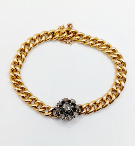 Bracelet Bracelet or jaune et argent, marguerite ornée de diamants 58 Facettes A05479