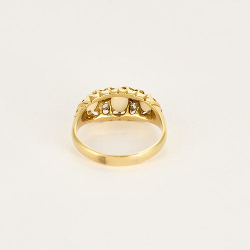 Bague 58 Bague type jarretière en or jaune, opales et diamants roses 58 Facettes MAR0975