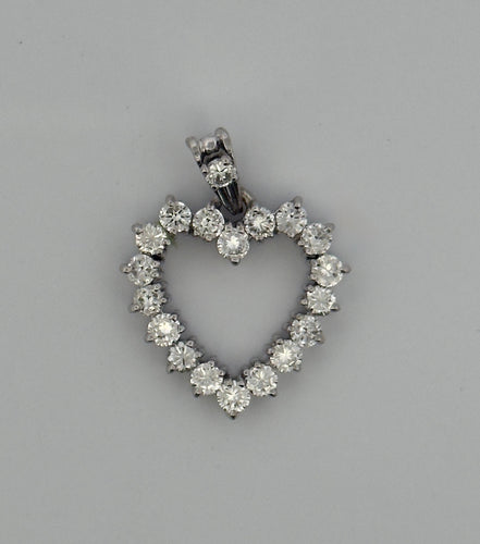 Pendentif Pendentif ancien cœur ajouré serti de diamants 58 Facettes