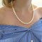 Collier Collier or blanc en perle de culture 58 Facettes
