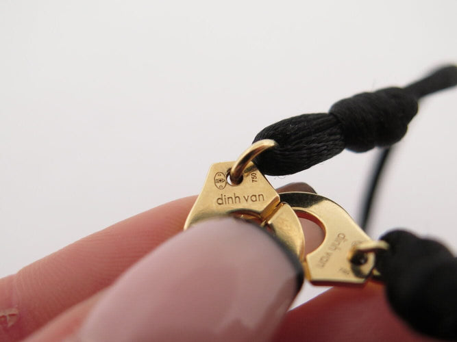Bracelet bracelet DINH VAN menottes r10 341102 en or jaune 18k 2.9gr & cordon noir 58 Facettes 270151