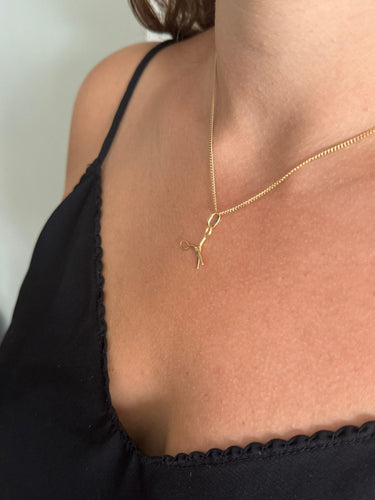 Pendentif Pendentif ciseau en or jaune 58 Facettes