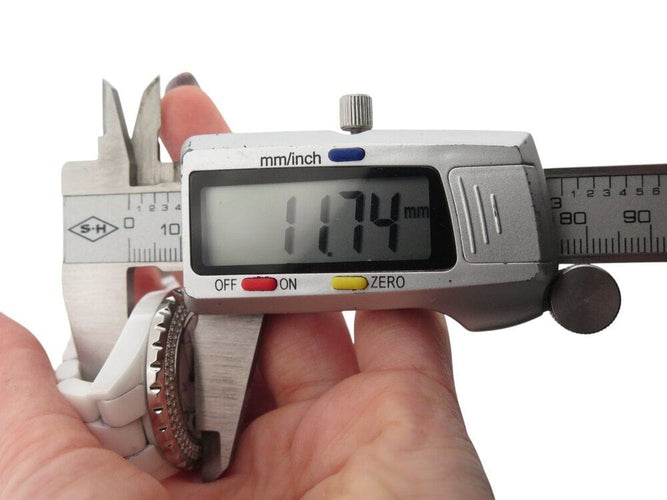 Montre montre CHANEL j12 34 mm h0967 112 diamants ceramique blanche quartz 58 Facettes 268147