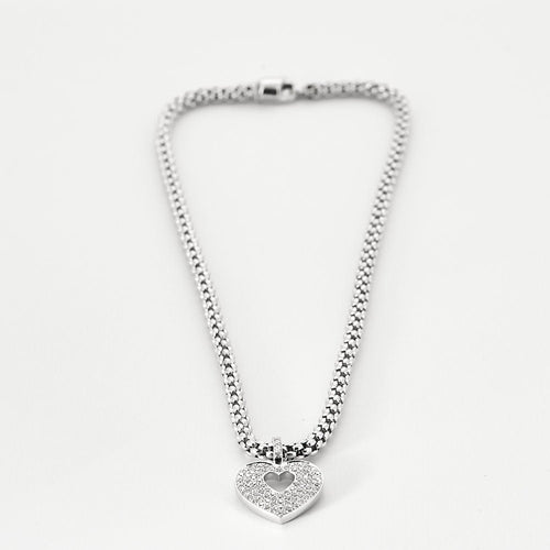 Collier POIRAY- Pendentif or blanc et diamants et chaîne en or blanc 58 Facettes 250360