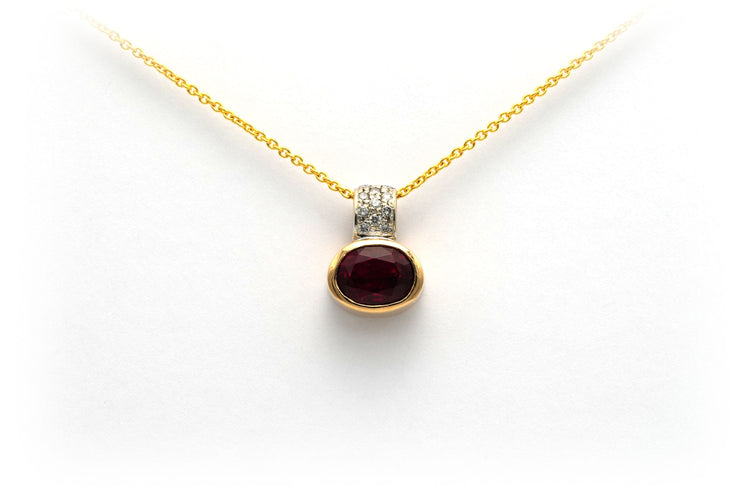 Pendentif Pendentif en or jaune et blanc serti de diamants d'une tourmaline 58 Facettes 18568