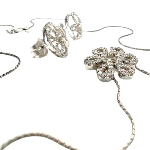 Collier Boucles d'oreilles et collier contemporains en or sertis de diamants 58 Facettes Q54B