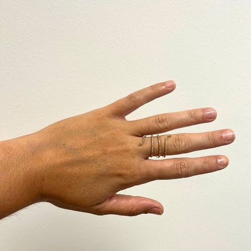 Bague spirale en or jaune et diamants