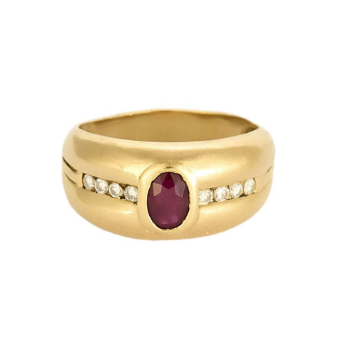 Bague bandeau en or jaune, rubis et diamants