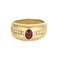 Bague bandeau en or jaune, rubis et diamants