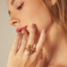 Ring 54 Divine Romance Ring in yellow gold, pearl and citrines 58 Facettes CHAT-ROM-RI-PCI