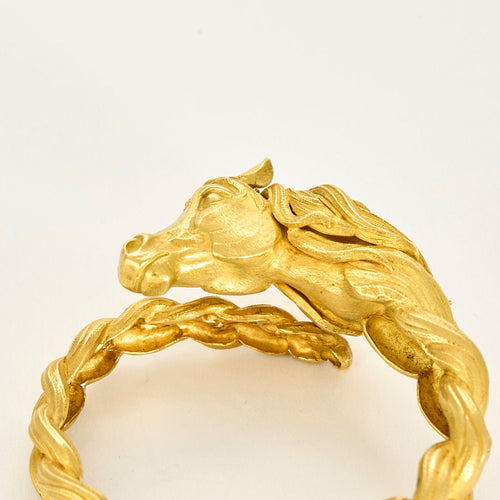 HERMES - Bracelet jonc en or jaune a motif de cheval