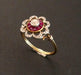 Ring 52.5 Ring Adorned with a Diamond, surrounded by Calibrated Rubies 58 Facettes