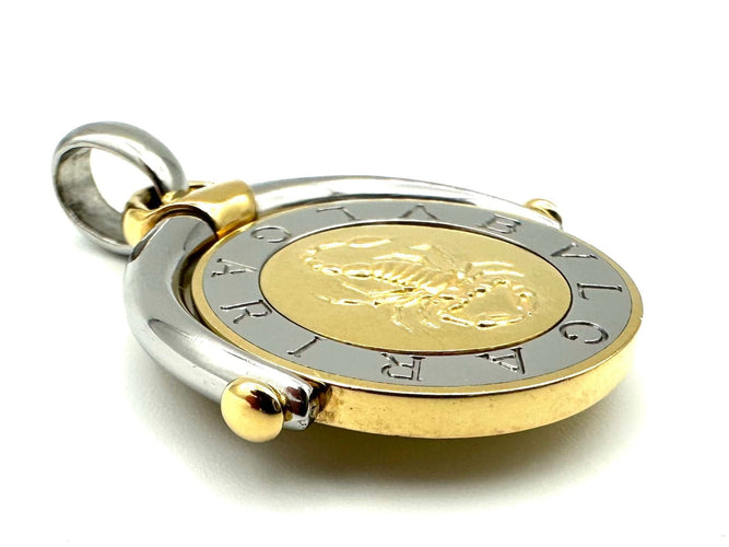 Pendentif BVLGARI. Pendentif vintage or et acier 58 Facettes