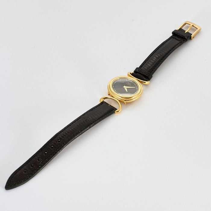 Montre PIAGET - Montre de dame en or jaune et onyx 58 Facettes