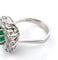 Bague 52 Bague en or blanc avec émeraude centrale et diamants 58 Facettes